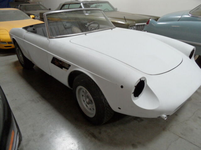 1967 ferrari 330 gtc converted to a spyder , using a original spyder to copy