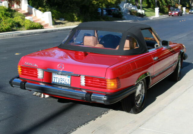 1986 mercedes benz 560sl, red on palomino interior and jumping seat excellent