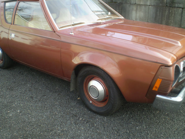 1974 amc gremlin original 3 speed copper color with original paper-work