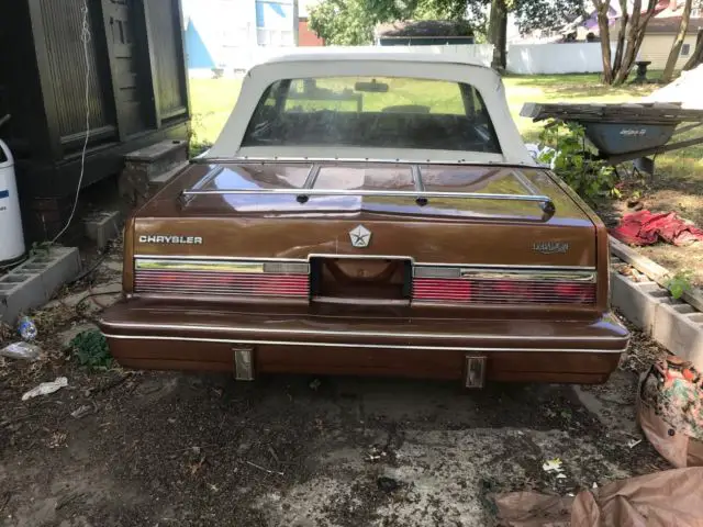 1983 chrysler lebaron woody convertible 79,000 miles , stored indoors see desc