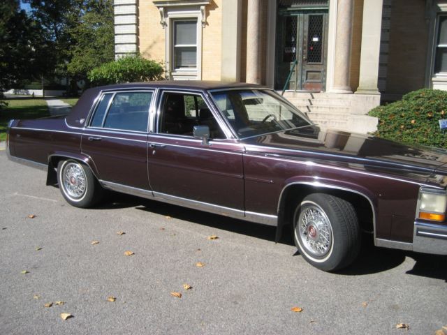 5.0 l v8 top-of-the-line burgundy pillow top leather interior wire wheels
