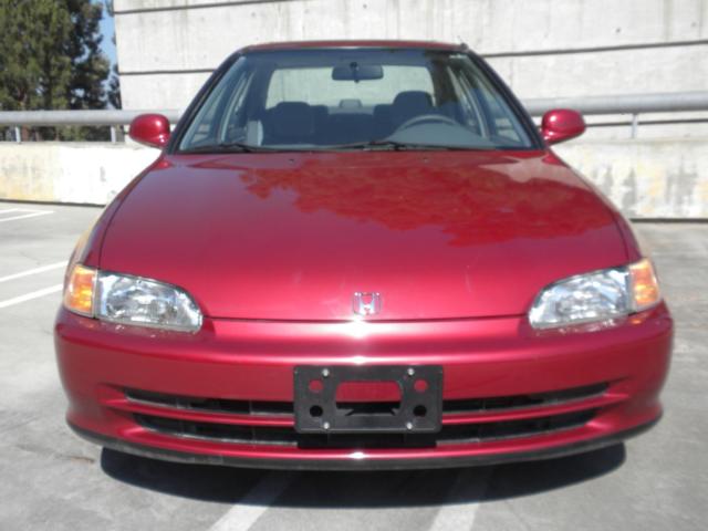 1994 honda civic ex sedan torino red pearl 15,000 original miles! no reserve
