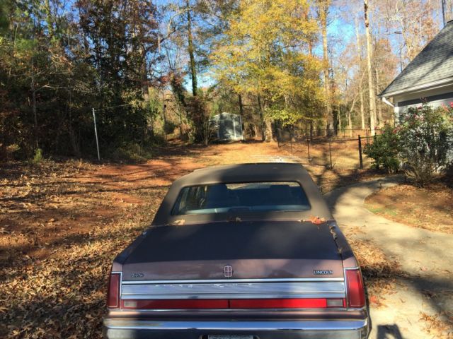 classic luxury car, brown town car signature