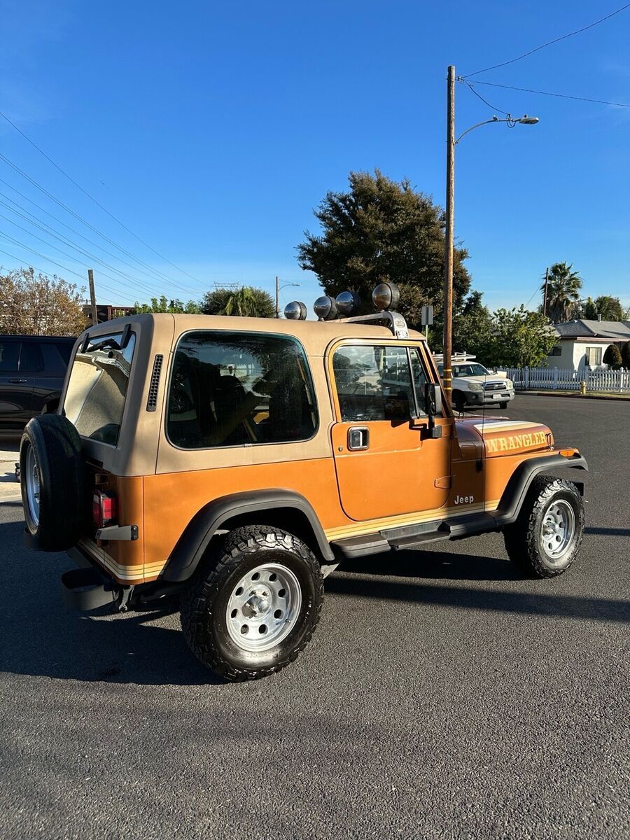 1987 jeep wrangler suv orange 4wd manual sport