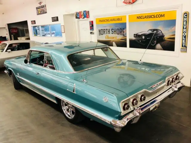 chevrolet impala turquoise with 54,661 miles, for sale!