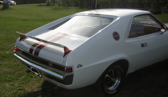 white car/red stripes.silver flake in clear coat on white,gold & silver on red