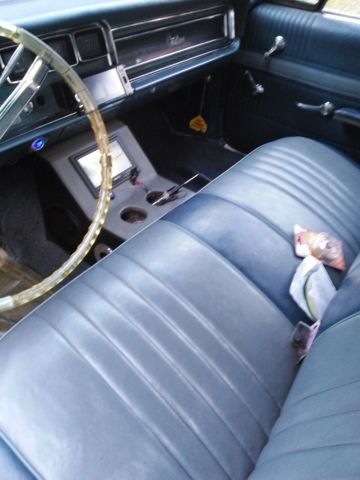 blue 1966 pontiac catalina with 24 inch rims, push start, stereo system restored