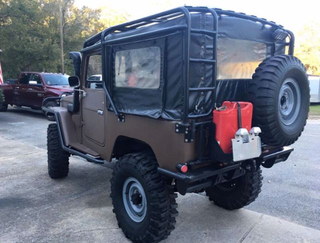 rare 5 speed 2f 6 cylinder safari package rear bench winch new 38.5 tires offer