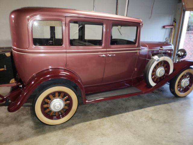 4 door sedan with suicide doors