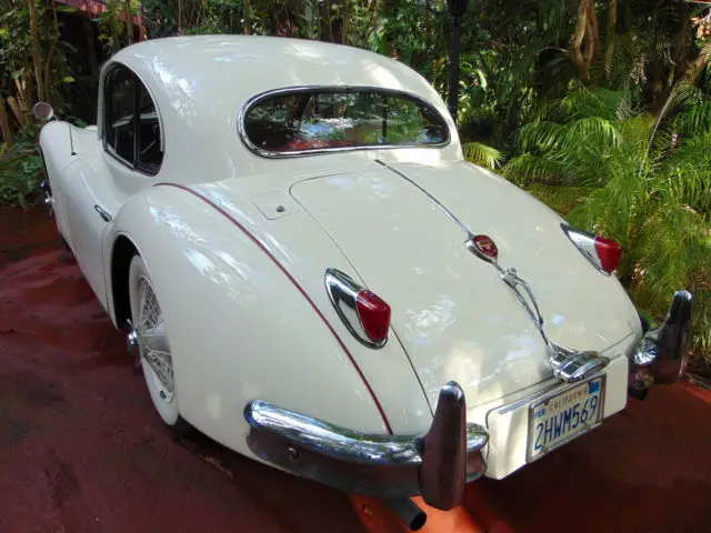 1957 jaguar xk 140 mc coupe. old english white with red interior. estate sale!!!