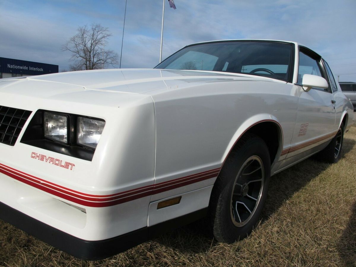 1988 monte carlo ss -only 52,700 miles -white/maroon -excellent -factory invoice