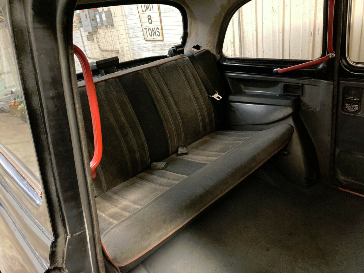 1981shiny black taxi austin fx4 london taxi