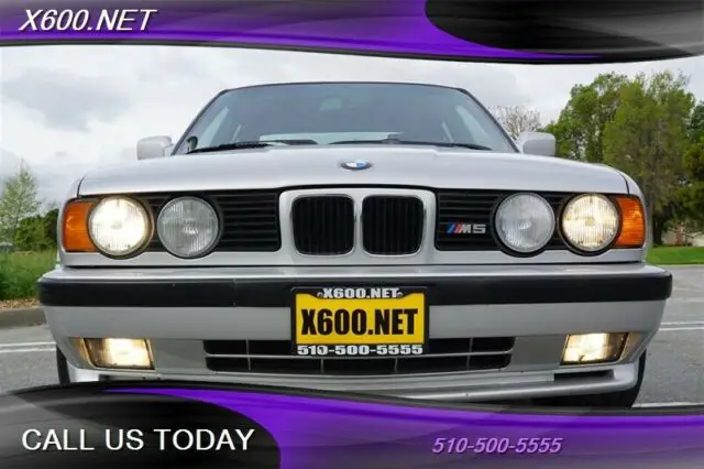 sterling silver metallic bmw m5 with 181,001 miles available now!