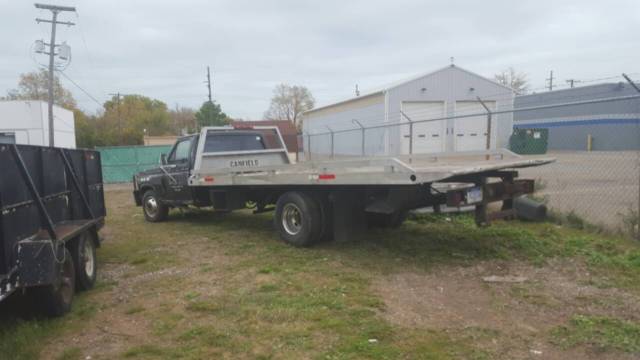 ford f350 diesel with 17 ft rollback flatbed aluminum bed