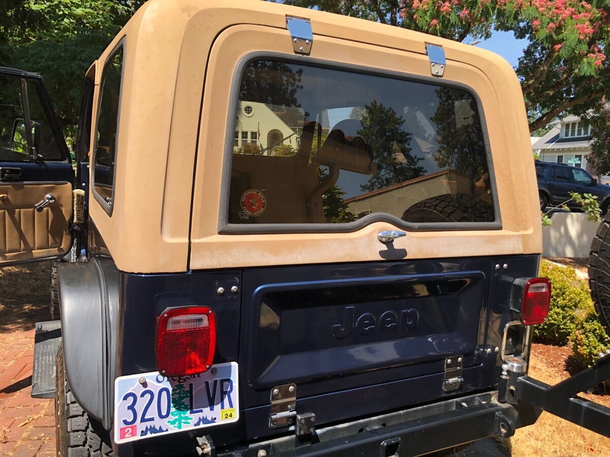1986 jeep cj7 added 2-1/2 doors in match'g blue to this ad. photos to follow