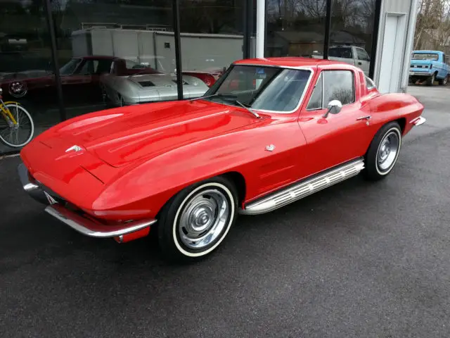 1964 corvette coupe, red on black leather trim