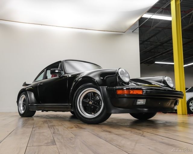 1987 porsche 930 turbo rare black over red sports seats