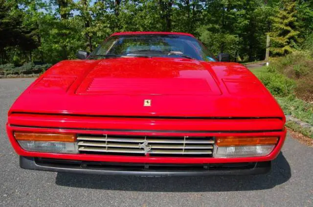 1987 ferrari 328 gts red with tan interior. 38500 miles