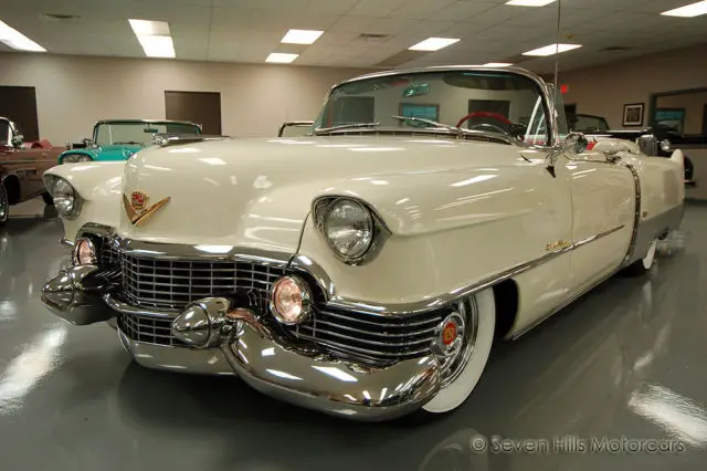 frame off restored, white with 2 tone red and white interior, spectacular car