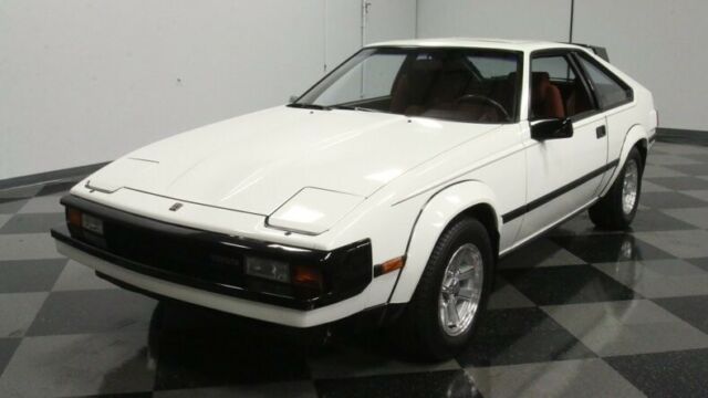classic vintage chrome japanese 2.8 liter inline 6 5-speed manual white