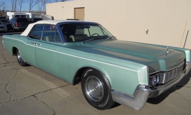 low miles! runs and looks great! power top! don't miss this vintage continental!