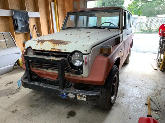 fj55 landcruiser runs and drives lots of rust on body. tough old rusty iron pig