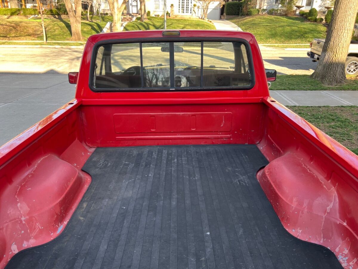 short bed, new motor, trans, custom exhaust, new brakes, shocks, tires and rims