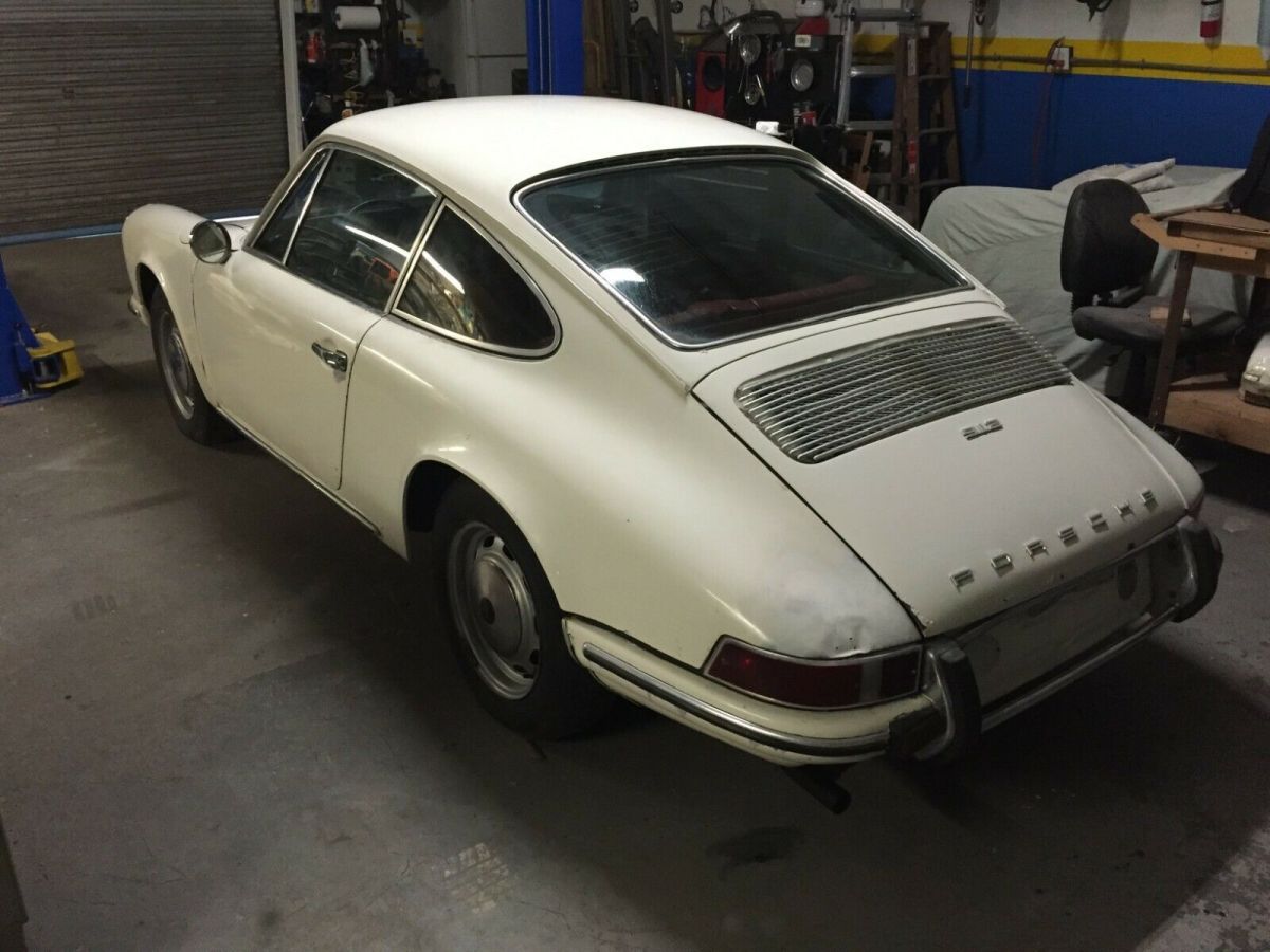 1969 porsche 912 coupe, white on red interior. worldwide transport one-stop shop