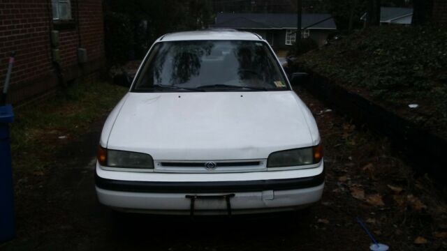 1994 mazda protege dx sedan 4d 64k original miles clean title runs drives!!!