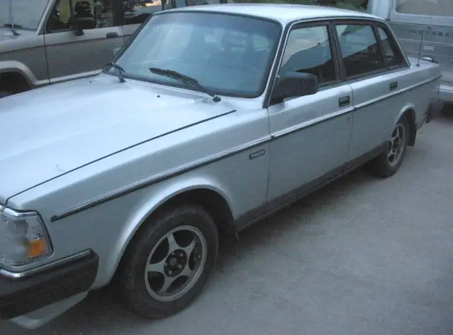 silver exterior black cloth interior 240dl