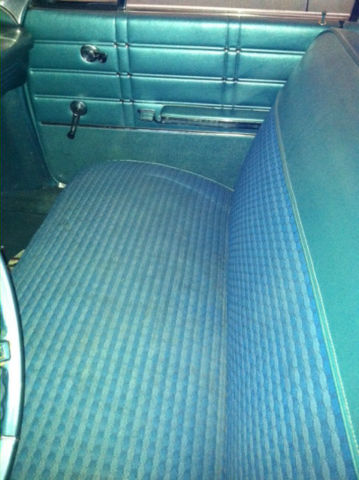1963 chevy impala. 91,000 miles, 4 door hard top, 4.3 engine, 3 on a tree colum