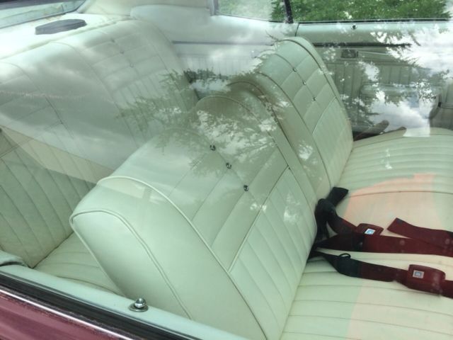 beautiful, dark cherry red, new white vinyl top, beautiful white interior