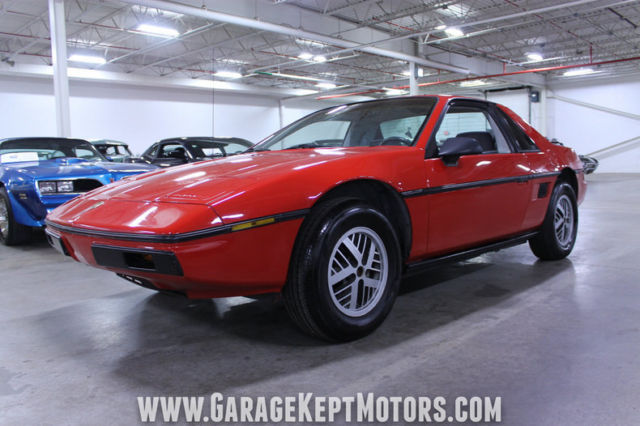 1984 pontiac fiero red coupe 2.5l i4 33,300 miles