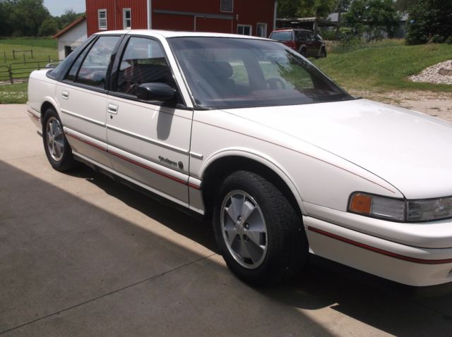 '91 olsmobile cutlass supreme 4 door sedan international1