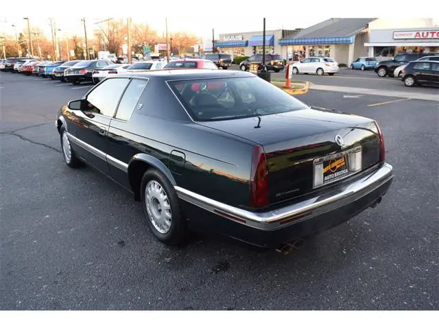 dark calypso green metallic cadillac eldorado with 58328 miles available now!