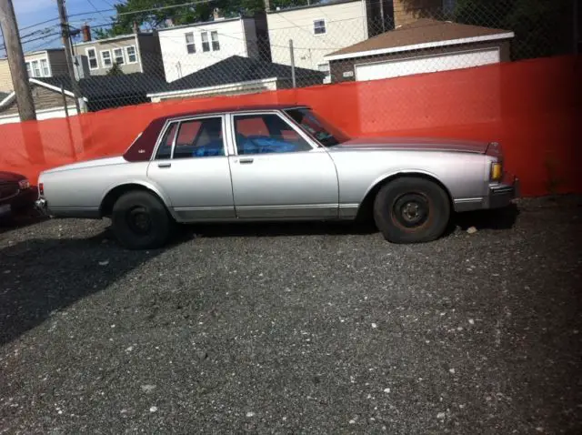 4-door white with burgundy canvas top
