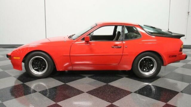 modern classic chrome sports car 2.5 liter 4 cylinder 5 speed manual red