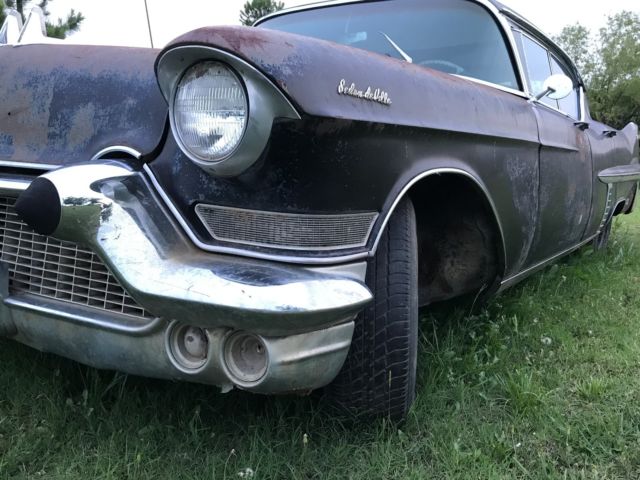 black 1957 cadillac sedan deville project