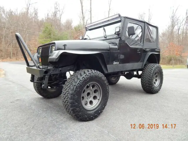 1994 jeep yj wrangler monster 4x4 * 6 cyl. 5 speed * a/c * lifted * no reserve