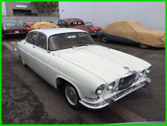 1962 jaguar mk10 sports saloon. oe white w/tan. 3.8 liter with triple carburetor