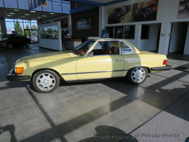 convertible hard top and soft top low miles unspecified gasoline 8 cyl maple yel