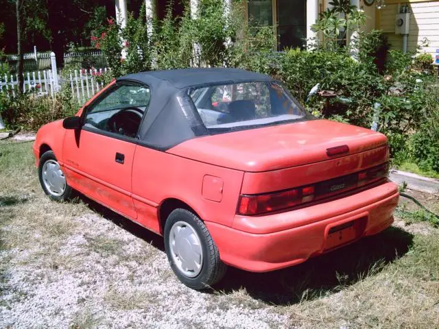 1992 geo metro lsi convertible red with black top, automatic with air, 50k miles