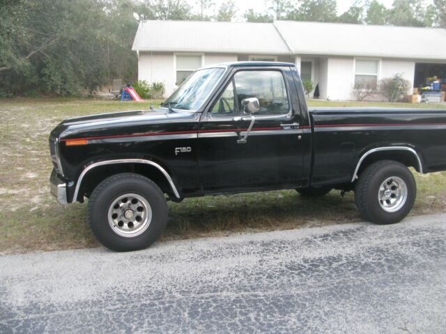 1985 ford f-150 4x4 automatic custom black 302 v8 beauty alot $$ in it