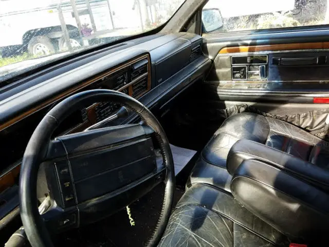 4 door, black exterior and interior, leather seats, new transmission