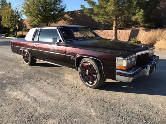 1980 cadillac deville 2 door coupe - 22 inch wheels with spinners - no reserve