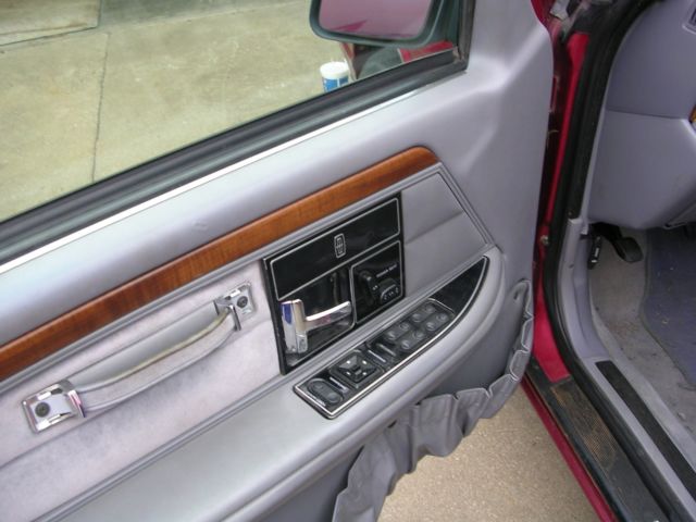 red 1994 lincoln continental signature 4 door sedan