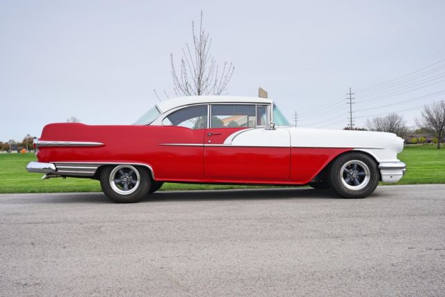 1956 pontiac chieftain 0 miles red / white