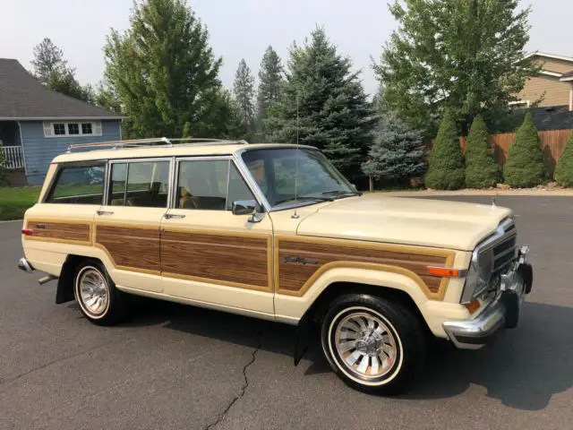 selling with no reserve 1987 jeep grand wagoneer buff yellow new motor 10 mi