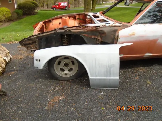 1972 orange datsun 240z rolling chassis