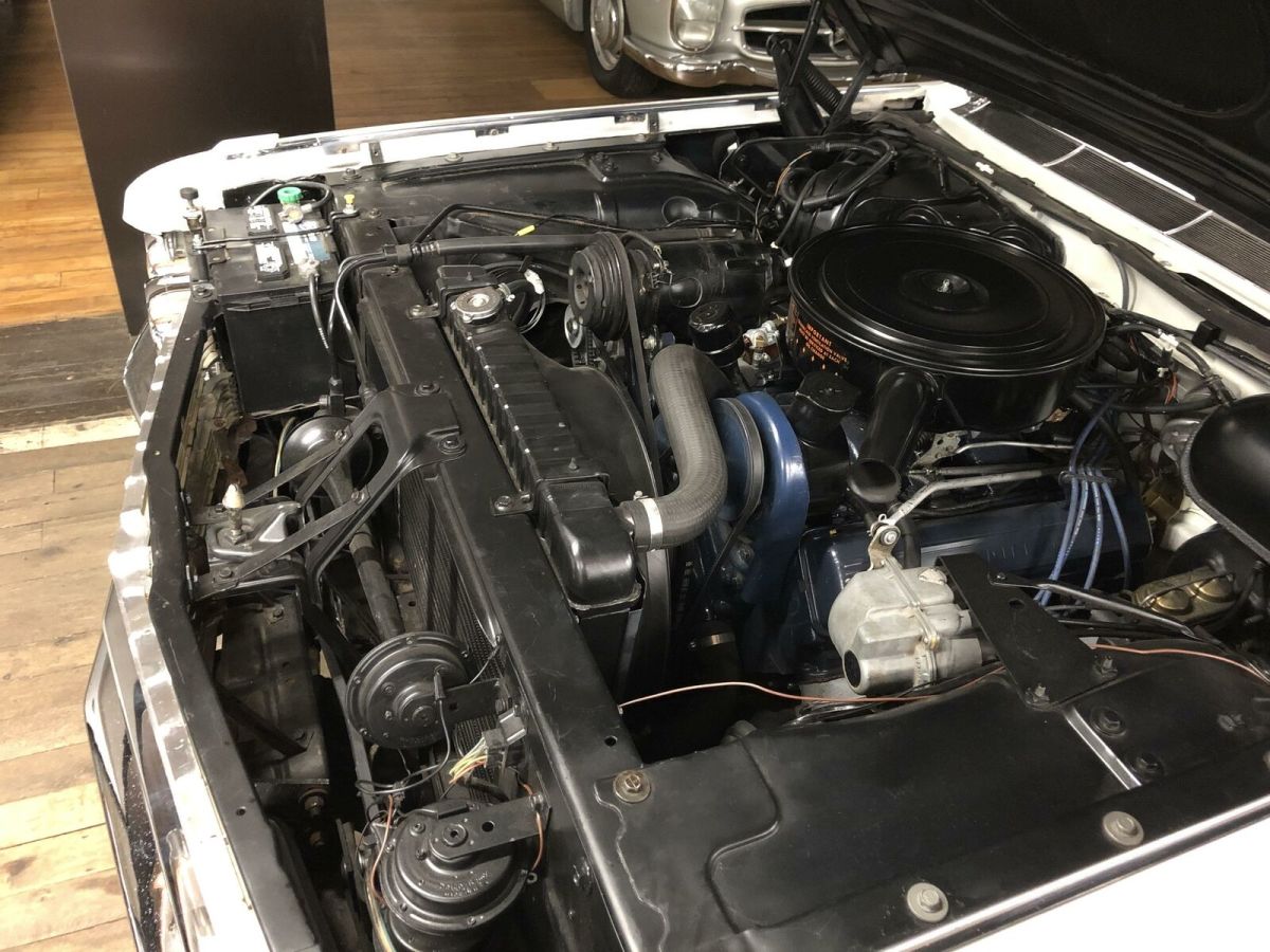 white cadillac eldorado biarritz with 43,000 miles available now!